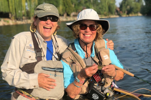 Fishing partners laughing Fishing partners laughing