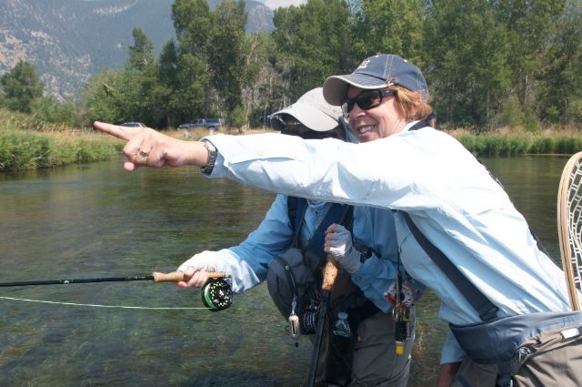 An MCI instructor teaching a student on the water. An MCI instructor teaching a student on the water.
